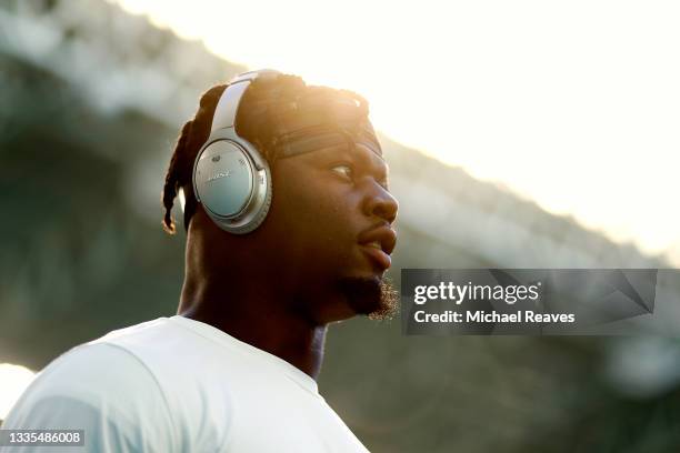 Jerome Baker of the Miami Dolphins warms up prior to the preseason game against the Atlanta Falcons at Hard Rock Stadium on August 21, 2021 in Miami...