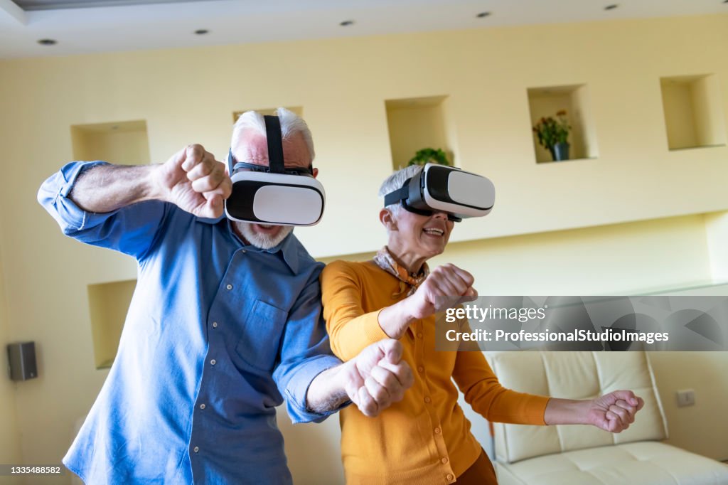 A Senior Couple is Playing Games with VR Set and Facing a Different Kind of Reality.