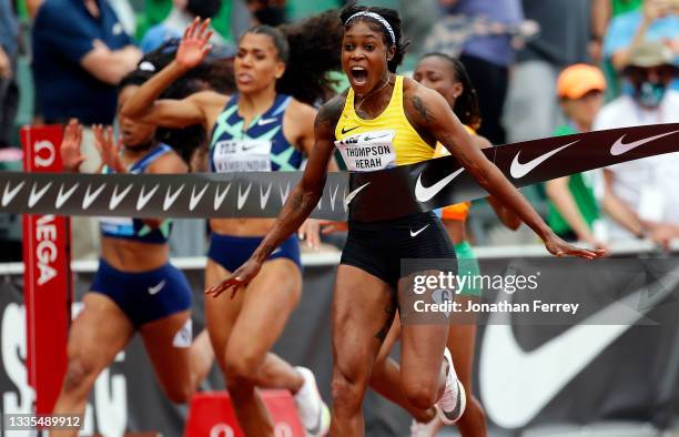 Elaine Thompson-Herah of Jamaica celebrates winning the 100m race during the Wanda Diamond League Prefontaine Classic at Hayward Field on August 21,...