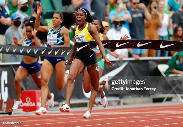 Elaine Thompson-Herah of Jamaica celebrates winning the 100m race during the Wanda Diamond League Prefontaine Classic at Hayward Field on August 21,...