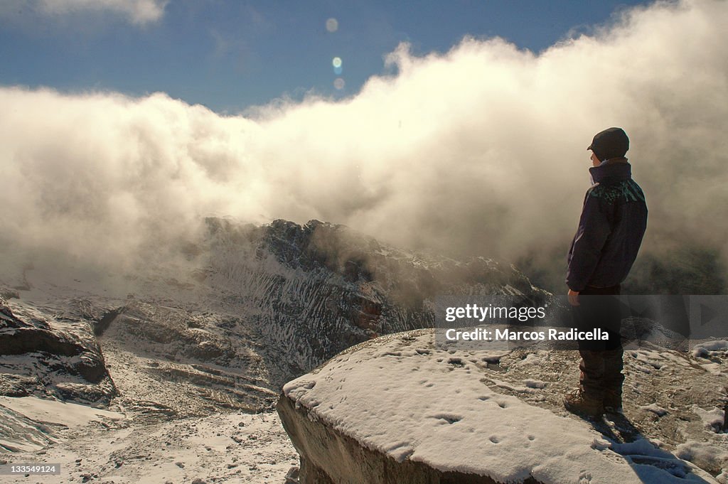 Boy staring at mountain view, Patagonia