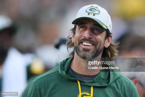 Aaron Rodgers of the Green Bay Packers looks on in the second half against the New York Jets during a preseason game at Lambeau Field on August 21,...