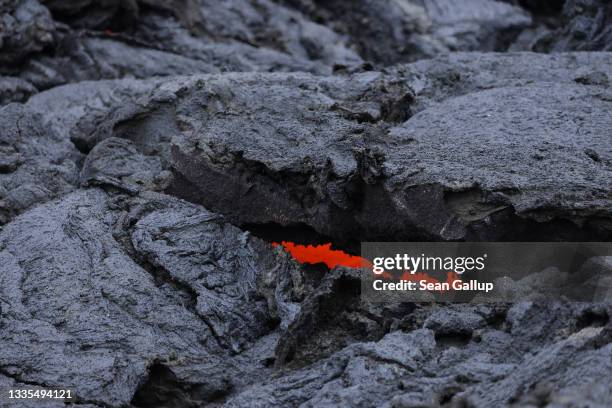 The still-hot, solid lava field lies under Fargradalsfjall volcano on August 19, 2021 near Grindavik, Iceland. The volcano, which erupted in March of...