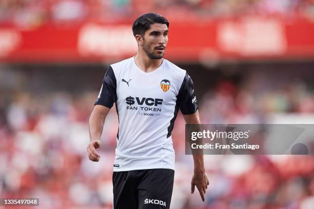 Carlos Soler of Valencia CF looks on during the La Liga Santander match between Granada CF and Valencia CF at Nuevo Estadio de Los Carmenes on August...