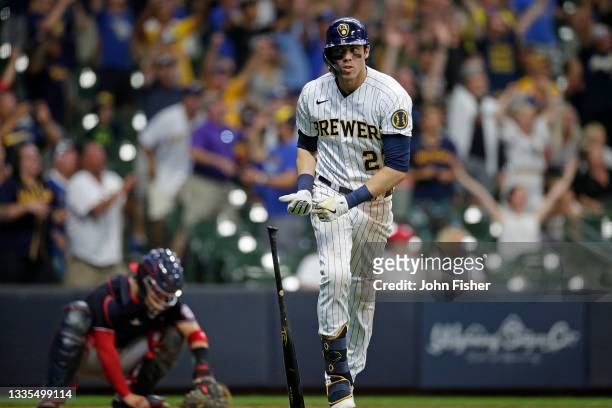 Christian Yelich of the Milwaukee Brewers hits a grand slam in the eighth inning against the Washington Nationals at American Family Field on August...