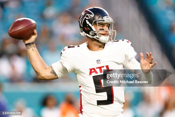 McCarron of the Atlanta Falcons looks to pass against the Miami Dolphins during a preseason game at Hard Rock Stadium on August 21, 2021 in Miami...