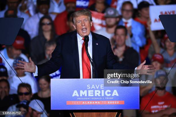 Former U.S. President Donald Trump addresses supporters during a "Save America" rally at York Family Farms on August 21, 2021 in Cullman, Alabama....