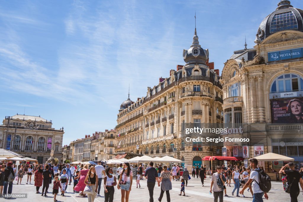 Place de la Comédie crowded in Summer, Montpellier, France