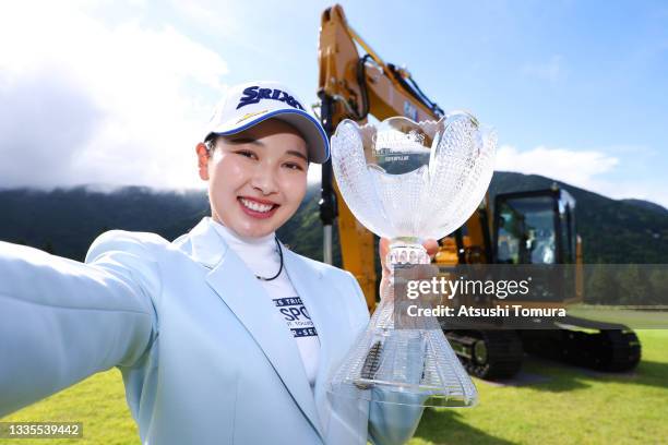 Sakura Koiwai of Japan imitates the selfie after winning the tournament following the final round of the CAT Ladies at Daihakone Country Club on...