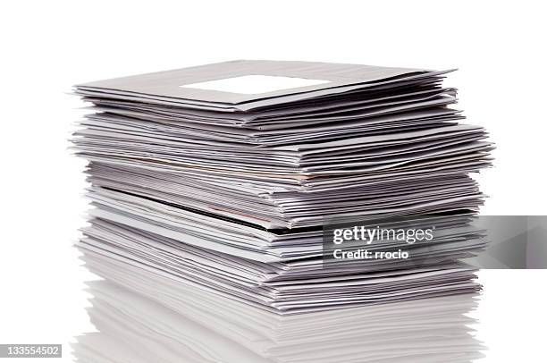 stack of gray unopened mail reflected on white background - stack stockfoto's en -beelden