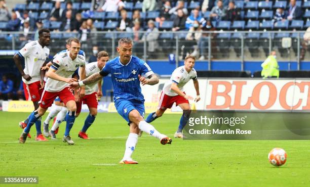Philip Tietz of SV Darmstadt 98 scores their side's first goal from the penalty spot during the Second Bundesliga match between Hamburger SV and SV...