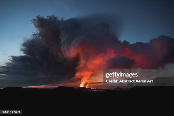 ash cloud and small tornado photographed at the eruption of fagradalsfjall volcano, reykjanes peninsula, iceland - volcano stock-fotos und bilder