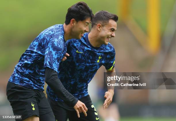 Heung-Min Son and Sergio Reguilon of Tottenham Hotspur warm up prior to the Premier League match between Wolverhampton Wanderers and Tottenham...