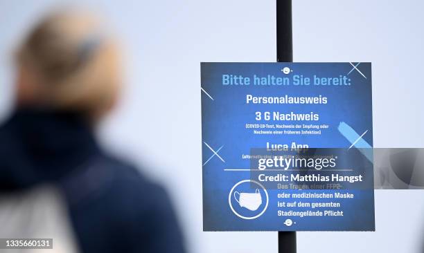 Covid-19 guidelines are displayed outside the stadium prior to the Bundesliga match between TSG Hoffenheim and 1. FC Union Berlin at PreZero-Arena on...