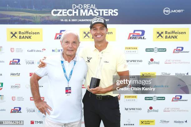 Johannes Veerman of United States poses with the trophy after winning the D+D Real Czech Masters alongside Dr Jiri Simane, Owner of the Albatross...