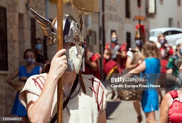 Man disguised as a soldier of ancient Rome participates in the opening parade of the Roman Festival in Honor of the God Bacchus, on 22 August, 2021...