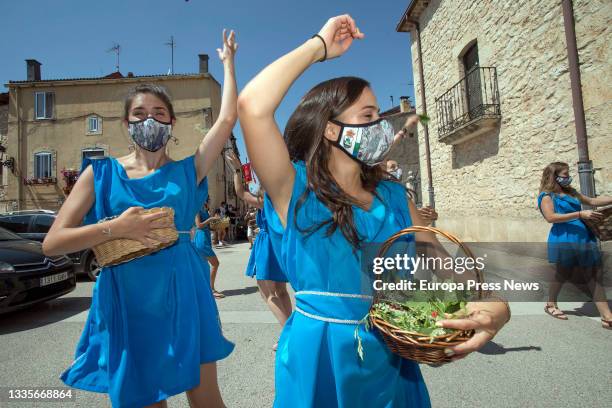 Several women participate in the opening parade of the Roman Festival in Honor of the God Bacchus, on 22 August, 2021 in Baños de Valdearados,...