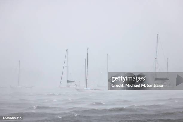 Docked boats on North Atlantic Ocean are seen as Tropical Storm Henri prepares to make landfall on August 22, 2021 in New London, Connecticut. A...