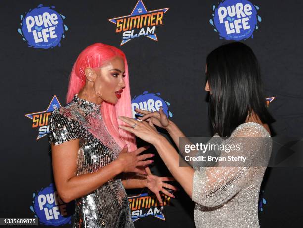 Professional wrestler Eva Marie and Television personality and professional wrestler Nikki Bella attend the WWE SummerSlam after party at Delano Las...