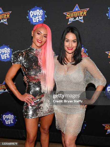 Professional wrestler Eva Marie and Television personality and professional wrestler Nikki Bella attend the WWE SummerSlam after party at Delano Las...