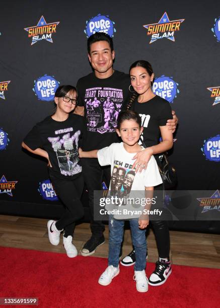 Gia Francesca Lopez, television personality Mario Lopez, Courtney Laine Mazza and Dominic Lopez attend the WWE SummerSlam after party at Delano Las...