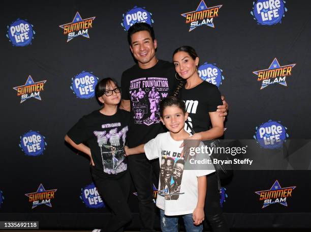 Gia Francesca Lopez, television personality Mario Lopez, Courtney Laine Mazza and Dominic Lopez attend the WWE SummerSlam after party at Delano Las...