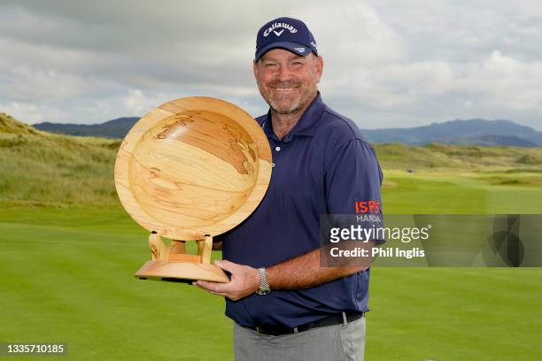 Thomas Bjorn of Denmark poses with the trophy after the final round of the Irish Legends at the Rosapenna Hotel & Golf Resort on August 22, 2021 in...