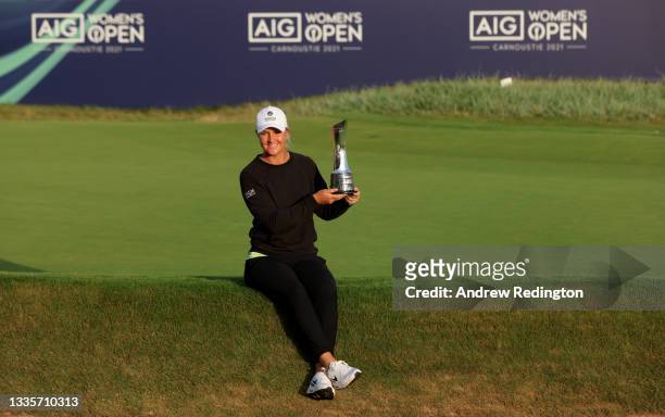 Anna Nordqvist of Sweden celebrates with the winners trophy on the 18th green the final round of the AIG Women's Open at Carnoustie Golf Links on...