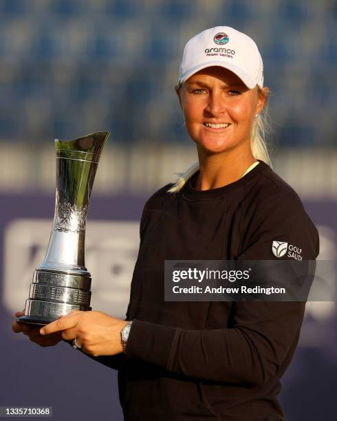 Anna Nordqvist of Sweden celebrates with the winners trophy on the 18th green the final round of the AIG Women's Open at Carnoustie Golf Links on...