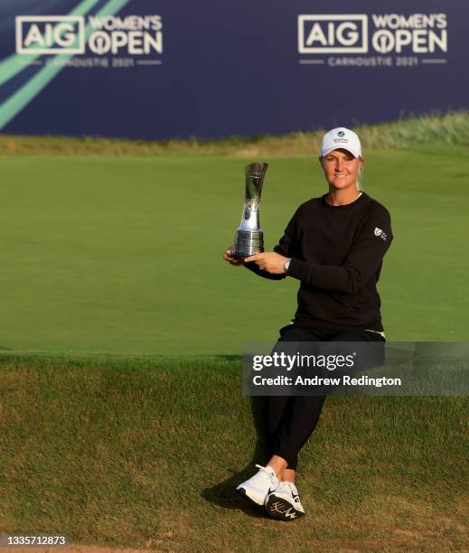 Anna Nordqvist of Sweden celebrates with the winners trophy on the 18th green after the final round of the AIG Women's Open at Carnoustie Golf Links...
