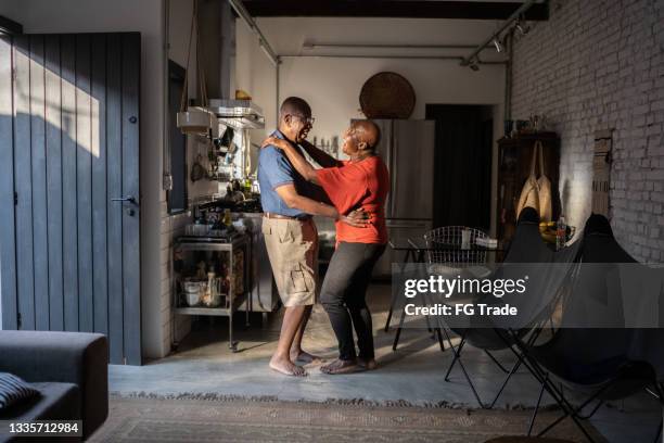 senior couple dancing at home - free pictures ballroom dancing stock pictures, royalty-free photos & images