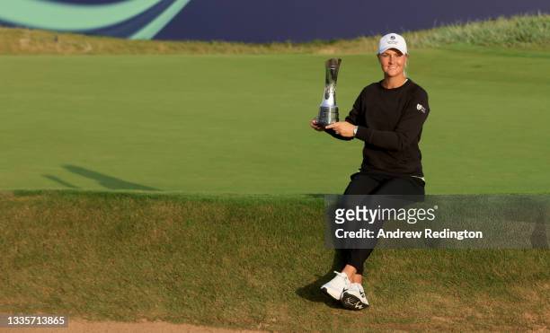 Anna Nordqvist of Sweden celebrates with the winners trophy on the 18th green after the final round of the AIG Women's Open at Carnoustie Golf Links...
