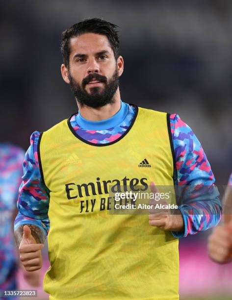 Isco of Real Madrid warms up prior to the LaLiga Santander match between Levante UD and Real Madrid CF at Ciutat de Valencia Stadium on August 22,...