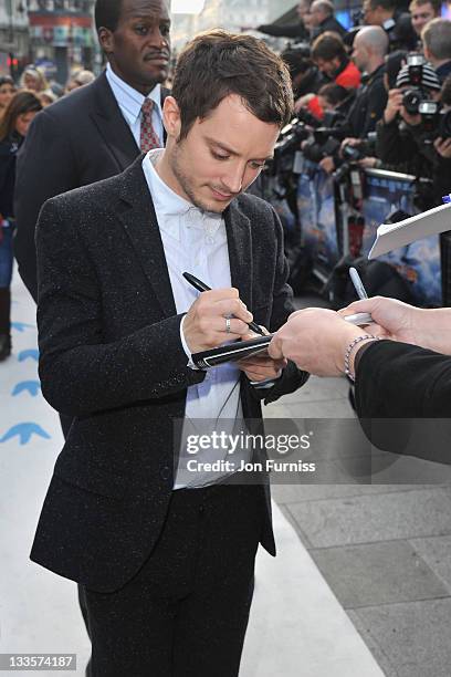 Elijah Wood attends the European Premiere of Happy Feet Two at Empire Leicester Square on November 20, 2011 in London, England.