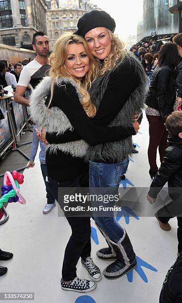 Nicola Mclean and Nikki Zilli attends the European Premiere of Happy Feet Two at Empire Leicester Square on November 20, 2011 in London, England.