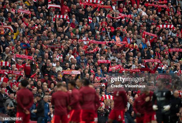 Liverpool fans singing 'You'll Never Walk Alone' before the Premier League match between Liverpool and Burnley at Anfield on August 21, 2021 in...
