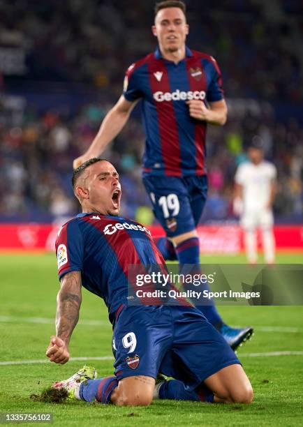 Roger Marti of Levante UD celebrates after scoring his team's first goal during the La Liga Santander match between Levante UD and Real Madrid CF at...