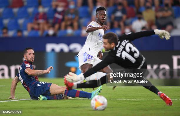 Vinicius Junior of Real Madrid scores their team's second goal during the LaLiga Santander match between Levante UD and Real Madrid CF at Ciutat de...