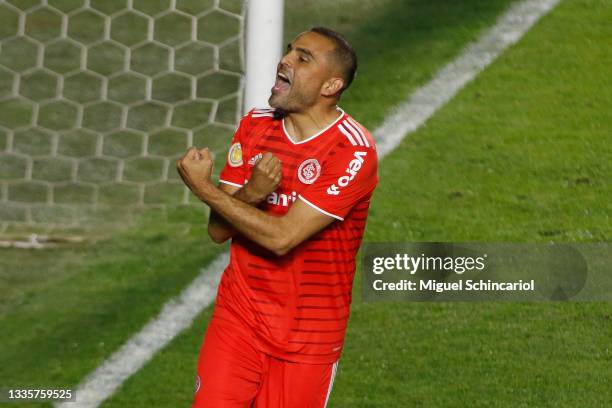 Gabriel Mercado of Internacional celebrates after scoring the first goal of his team during a match between Santos and Internacional as part of...