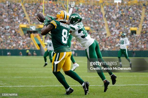 Sharrod Neasman of the New York Jets breaks up a pass intended for Amari Rodgers of the Green Bay Packers in the first half of a preseason game at...