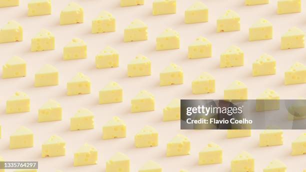 swiss cheese slice pattern background - cheese stockfoto's en -beelden