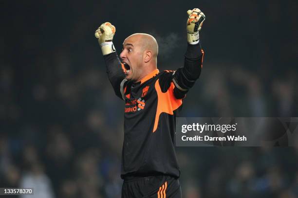 Jose Reina of Liverpool celebrates the winning goal during the Barclays Premier League match between Chelsea and Liverpool at Stamford Bridge on...