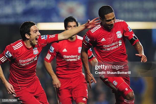 Glen Johnson of Liverpool celebrates his goal with Stewart Downing during the Barclays Premier League match between Chelsea and Liverpool at Stamford...