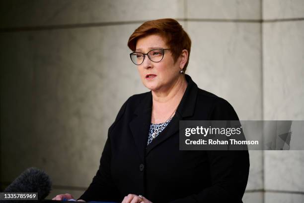 Australian Foreign Minister Marise Payne discusses the Government's plan to 'live with the virus' during a press conference at Parliament House on...