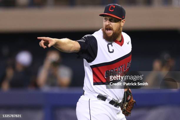 Pitcher Bryan Shaw of the Cleveland Indians reacts after the final out of the eighth inning against the Los Angeles Angels in the 2021 Little League...