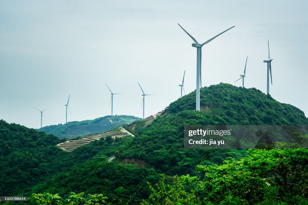 He wind turbine on the top of the mountain. Anhui Province, China.