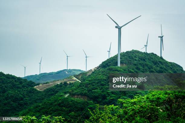 he wind turbine on the top of the mountain. anhui province, china. - carbon neutrality stock pictures, royalty-free photos & images