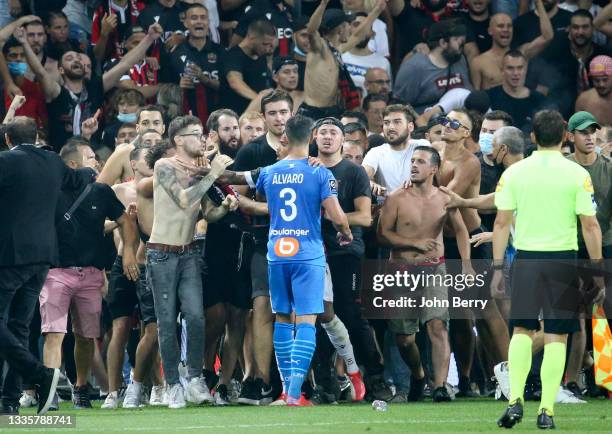 Incidents between the players of Marseille - here Alvaro Gonzalez of OM - and the supporters of Nice who entered the pitch during the Ligue 1 match...