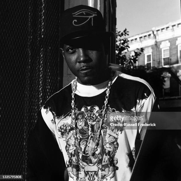 Black man poses for a portrait in the neighborhood of Bed Stuy in 2011.