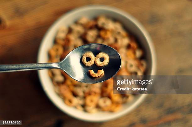 smiling cereal - smiley face stock-fotos und bilder